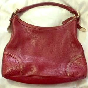 Red leather Gucci bag
